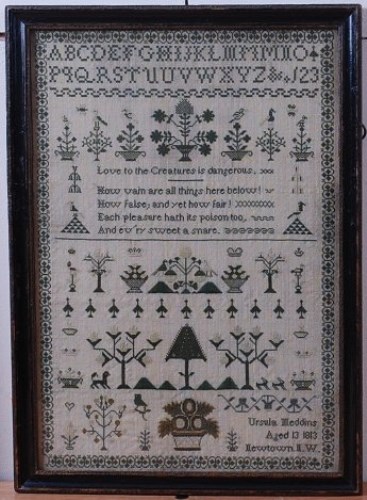 Lot 1337 - An early 19th century needlework alphabet,...