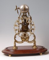 Lot 1528 - A brass skeleton clock, having pierced...