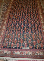 Lot 1550 - A Persian woollen hall runner of good size,...