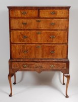 Lot 1569 - An early 19th century walnut chest, on...