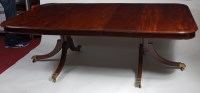 Lot 1576 - An antique mahogany twin pedestal dining table,...