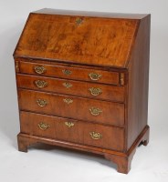 Lot 1577 - A George III walnut writing bureau, the...