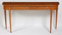 Lot 1592 - A satinwood and ebony strung hall table, in...