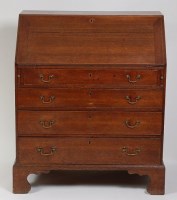 Lot 1600 - A George III oak bureau, the hinged fall...