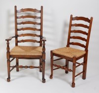 Lot 1610 - A set of nine Lancashire style oak ladderback...