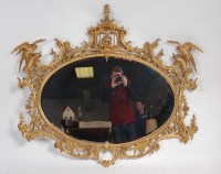 Lot 1613 - A Rococo Revival giltwood and gesso wall...