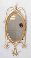 Lot 1614 - A 19th century gilt gesso wall mirror, the...