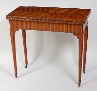 Lot 1585 - A George II laburnum veneered card table, the...