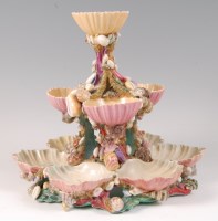 Lot 1158 - A Royal Worcester porcelain three-tier oyster...