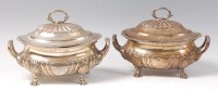 Lot 1192 - A pair of late George III silver tureens and...