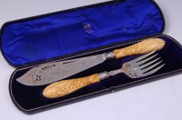 Lot 1198 - A pair of Victorian silver fish servers, the...