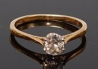 Lot 2004 - An 18ct gold diamond solitaire ring, the claw...