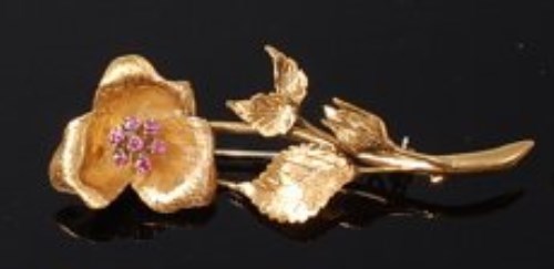 Lot 2011 - A modern 18ct gold and pink sapphire set leaf...