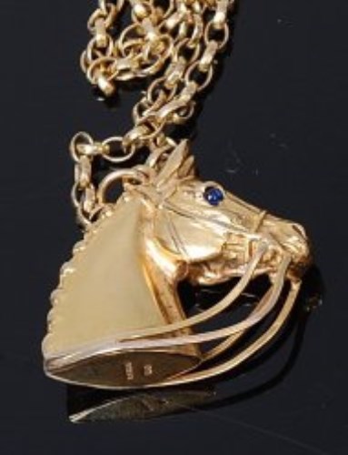 Lot 2019 - A Harriet Glen 9ct gold pendant as a horses...