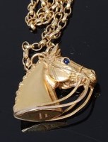 Lot 2019 - A Harriet Glen 9ct gold pendant as a horses...
