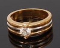 Lot 2024 - An 18ct gold diamond solitaire ring, the heavy...