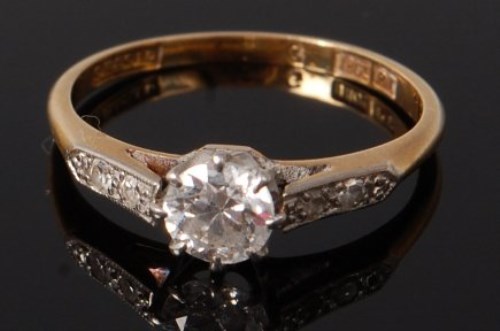 Lot 2065 - An 18ct gold and platinum diamond solitaire...