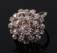 Lot 2088 - A 14ct white gold diamond cluster ring,...