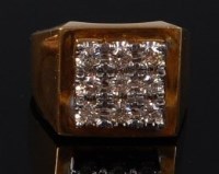 Lot 2092 - A gents 18ct gold and diamond set signet ring,...