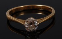 Lot 2105 - An 18ct gold diamond solitaire ring, the claw...