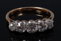 Lot 2108 - An 18ct gold and platinum diamond five stone...