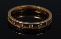Lot 2109 - An 18ct gold diamond half eternity ring,...