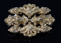 Lot 2112 - A yellow metal leaf and flower embossed brooch,...