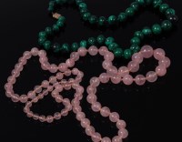 Lot 2114 - A beaded malachite single string knotted...