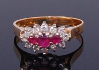 Lot 2121 - An 18ct gold, ruby and diamond dress ring,...