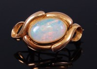 Lot 2125 - A 9ct gold cabochon opal set brooch, 5.3g, 3cm