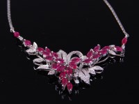 Lot 2126 - A contemporary 18ct white gold, ruby and...