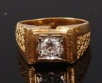 Lot 2155 - A gents 18ct gold diamond solitaire ring, the...