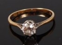 Lot 2170 - An 18ct gold and platinum diamond solitaire...