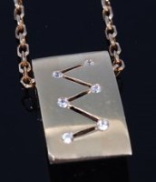 Lot 2179 - A modern 14ct gold pendant set with six small...