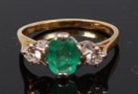 Lot 2208 - An 18ct gold, emerald and diamond ring,...
