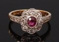 Lot 2219 - An 18ct gold and platinum, ruby and diamond...