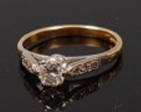 Lot 2224 - An 18ct gold diamond solitaire ring, the claw...