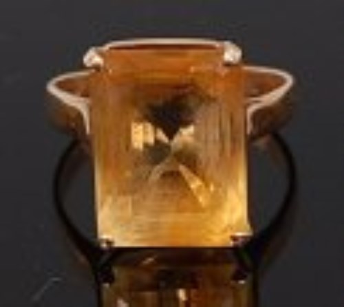 Lot 2233 - A modern 14ct gold citrine set dress ring, the...