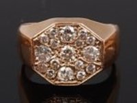 Lot 2234 - A gents 9ct gold diamond set ring, the...