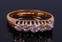 Lot 2245 - An 18ct gold diamond five stone ring, the claw...