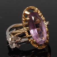 Lot 2250 - A modern 14ct gold and amethyst dress ring,...
