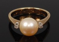 Lot 2251 - A 14ct gold and cultured pearl set dress ring,...