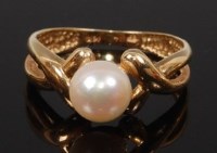 Lot 2252 - A 14ct gold and cultured pearl set dress ring,...