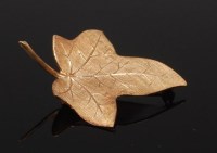 Lot 2255 - A modern 9ct gold brooch modelled as an ivy...