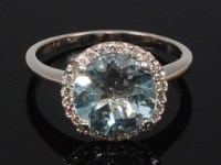 Lot 2270 - A modern 14ct white gold, blue topaz and...