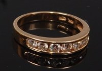 Lot 2272 - A 14ct gold diamond seven stone ring, arranged...