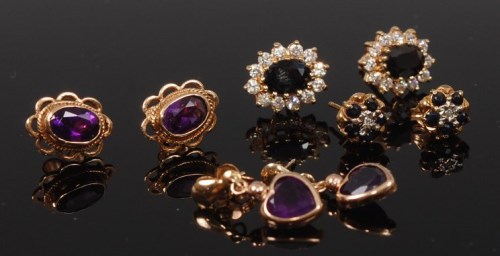 Lot 2273 - A pair of 9ct gold and oval cut amethyst set...