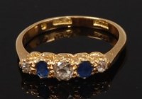 Lot 2279 - An 18ct gold, sapphire and diamond ring,...