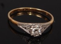 Lot 2283 - An 18ct gold diamond solitaire ring, the...