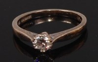 Lot 2298 - An 18ct white gold diamond solitaire ring, the...